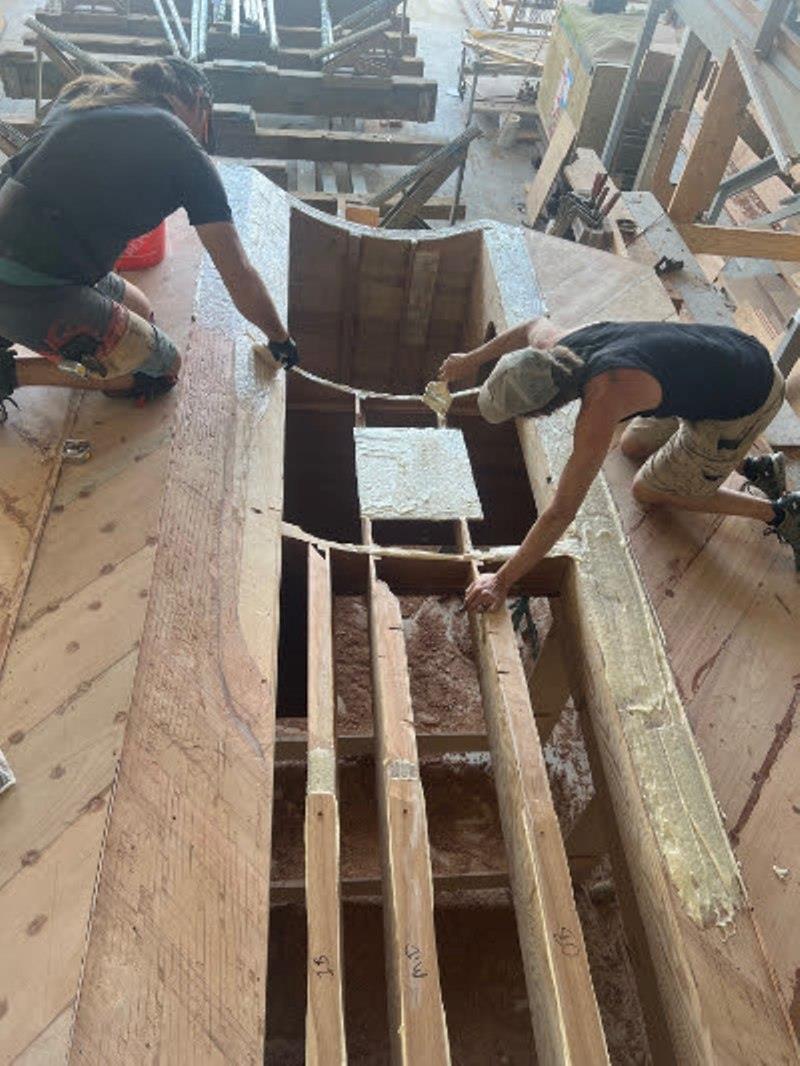 Hull #11 - Gluing in the tunnels - photo © Michael Rybovich & Sons