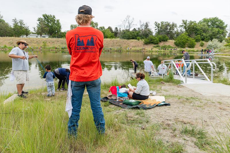 Families took turns fishing from the newly installed AccuDock fishing piers during the USA's Tri-Cities Take Kids Fishing Day - photo © Union Sportsmen's Alliance
