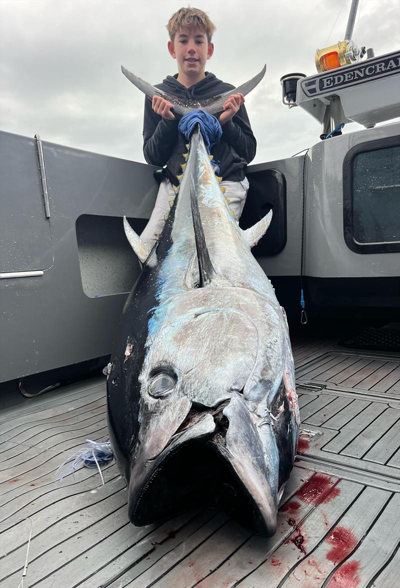 Flynn Hooker with a 120kg blue caught in Munroes a 4.5 Flying Fish photo copyright Spot On Fishing Hobart taken at  and featuring the Fishing boat class