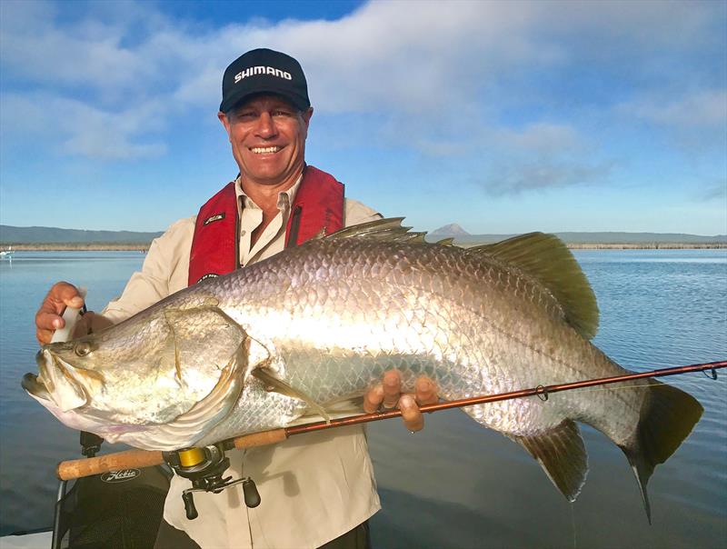 One of my favourite fish to catch - a big Barramundi. I am actually standing up in a kayak in this shot photo copyright Andrew Ettingshausen taken at  and featuring the Fishing boat class