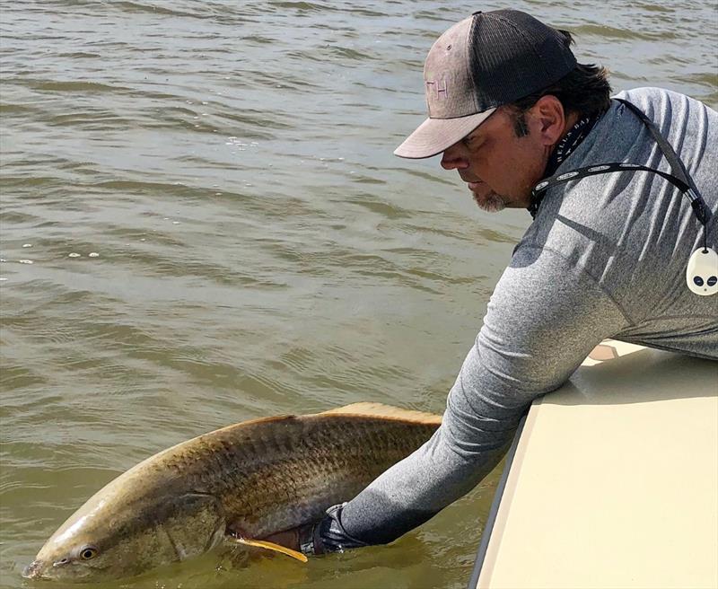 Reel in the redfish while staying at The Pelican Lodge - photo © Hell's Bay Boatworks