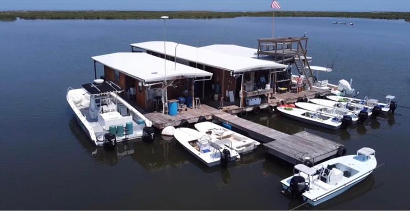 Reel in the redfish while staying at The Pelican Lodge photo copyright Hell's Bay Boatworks taken at  and featuring the Fishing boat class