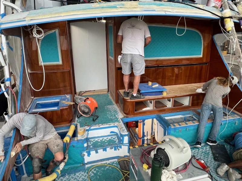 Hull #8 - The Tracy boys prepping for clear coat photo copyright Michael Rybovich & Sons taken at  and featuring the Fishing boat class