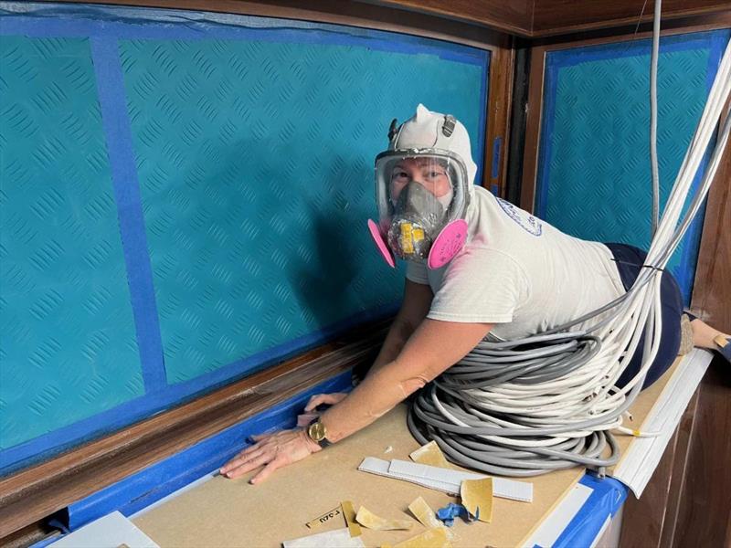 Hull #8 - Cheryl Ann prepping galley brightwork - photo © Michael Rybovich & Sons