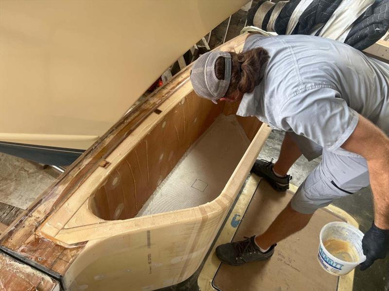 Hull #9 - Paul assembling transom fishbox - photo © Michael Rybovich & Sons