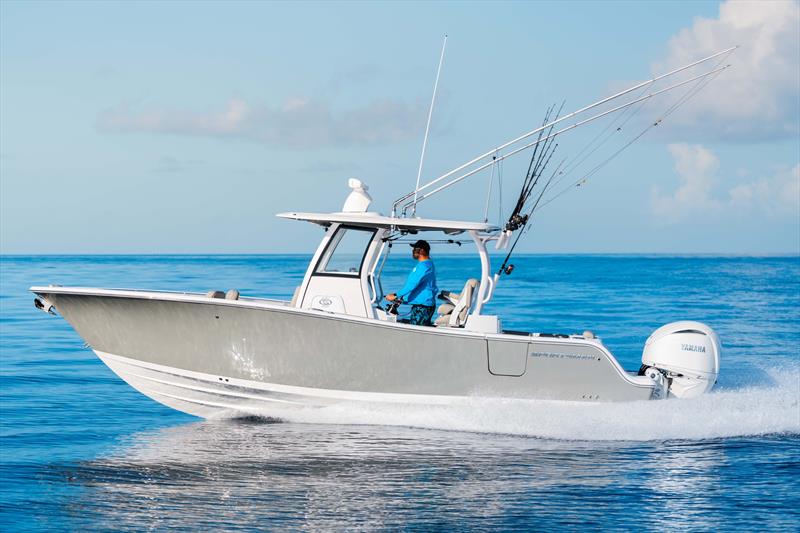 The early morning sunlight reflecting off the hull side of the Open 282 lights up the Shadow Gray making it appear much lighter - photo © Sportsman Boats