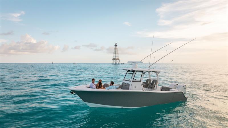 The evening light casts a shadow on the port side of the Open 282 bringing out the rich dark gray color photo copyright Sportsman Boats taken at  and featuring the Fishing boat class