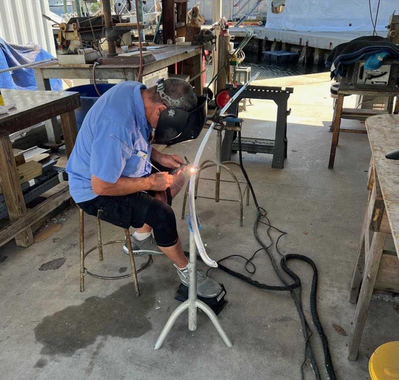 Hull #8 - Brian D welding deckhouse grab rails photo copyright Michael Rybovich & Sons taken at  and featuring the Fishing boat class