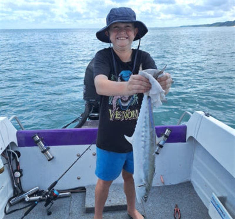 Alexander was very happy with this mackerel. They are in the bay in bigger numbers now so go get into them photo copyright Fisho's Tackle World taken at  and featuring the Fishing boat class