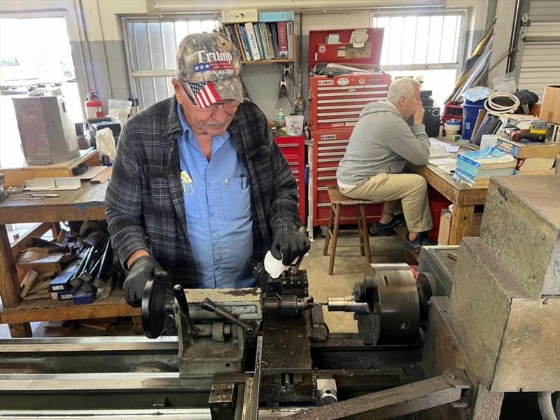 Hull #10 - Brian D turning trim tab parts - photo © Michael Rybovich & Sons