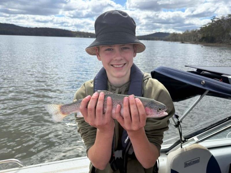 Esmond with a Tooms Lake Rainbow photo copyright Spot On Fishing Hobart taken at  and featuring the Fishing boat class