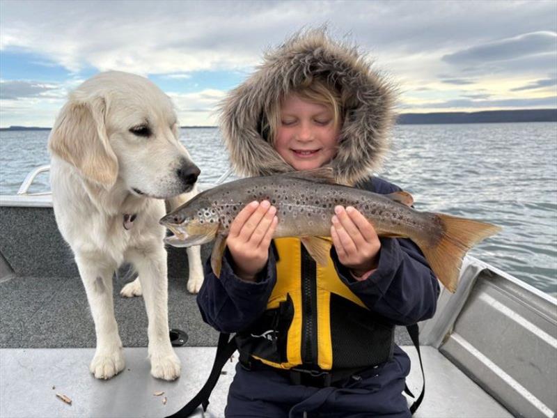 Emma and Maisy with a Great Lake brown caught on the MOJO24 photo copyright Spot On Fishing Hobart taken at  and featuring the Fishing boat class