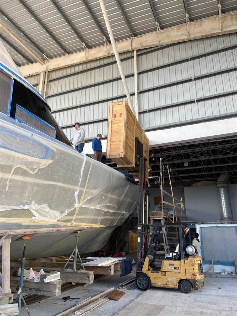 Hull #9 - Lifting the deckhouse glass - photo © Michael Rybovich & Sons