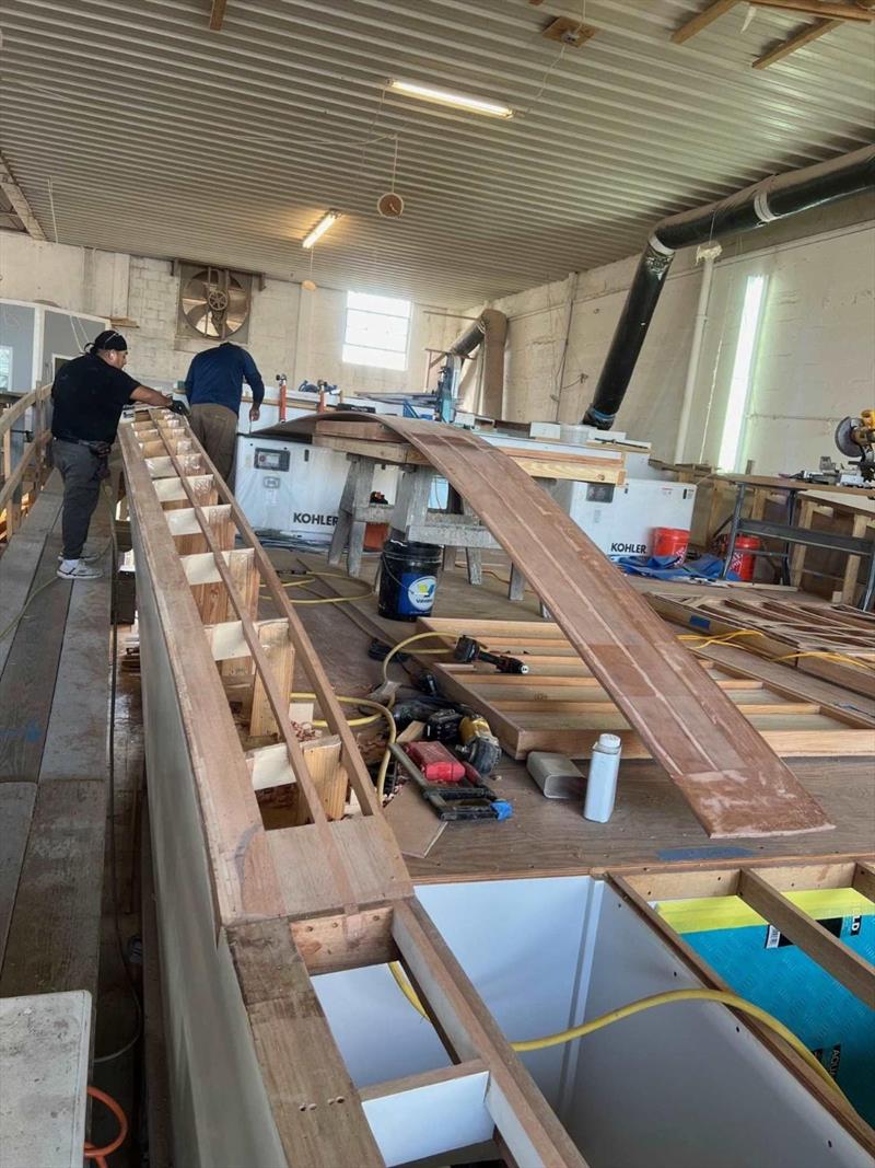 Hull #11 - Port side deck installation - photo © Michael Rybovich & Sons