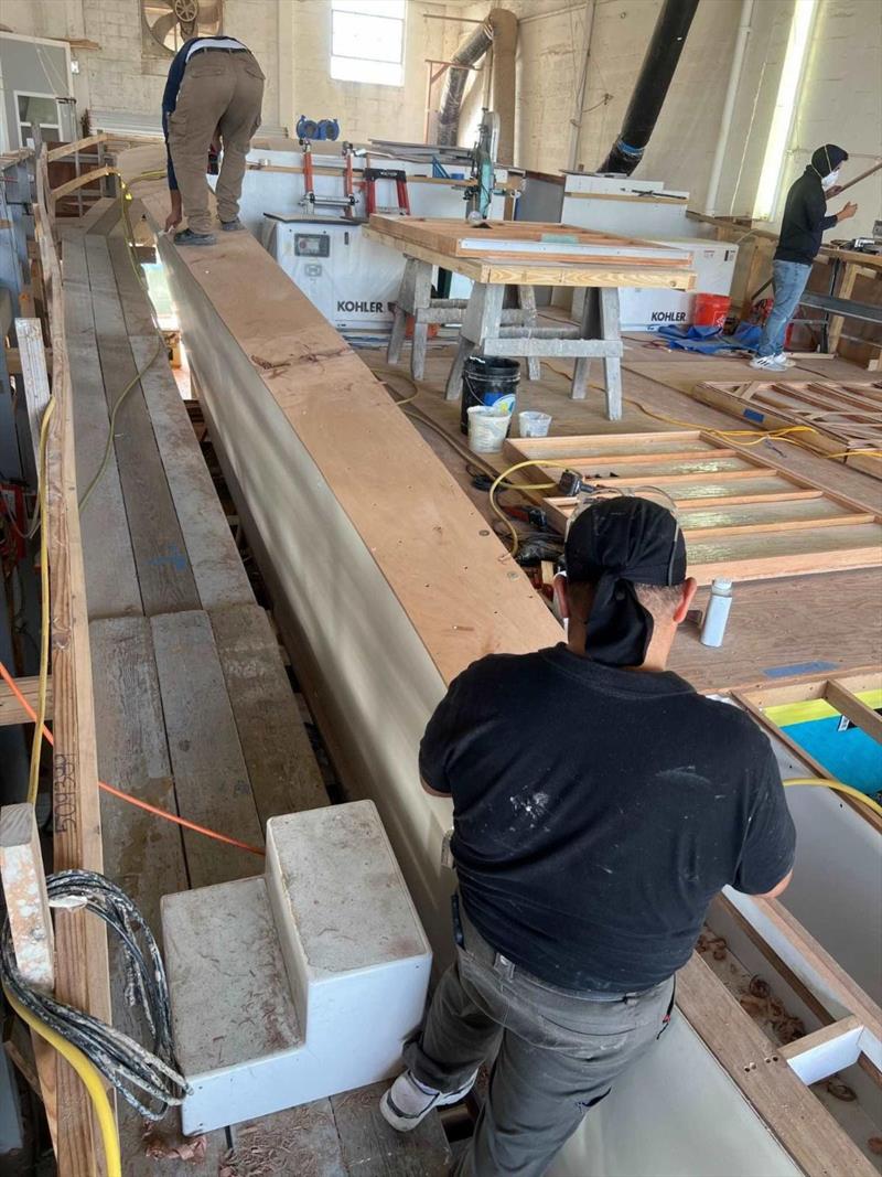 Hull #11 - Port side deck glued down - photo © Michael Rybovich & Sons