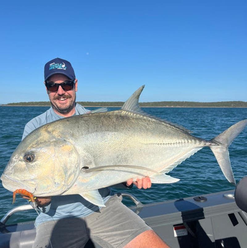 Scotty with proof there are still big bruiser GTs prowling our inshore reefs - photo © Fisho's Tackle World