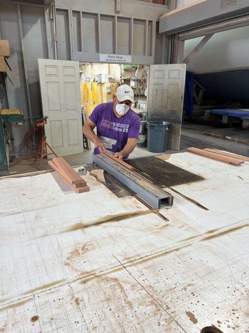 Hull #10 - Marcos on the table saw - photo © Michael Rybovich & Sons