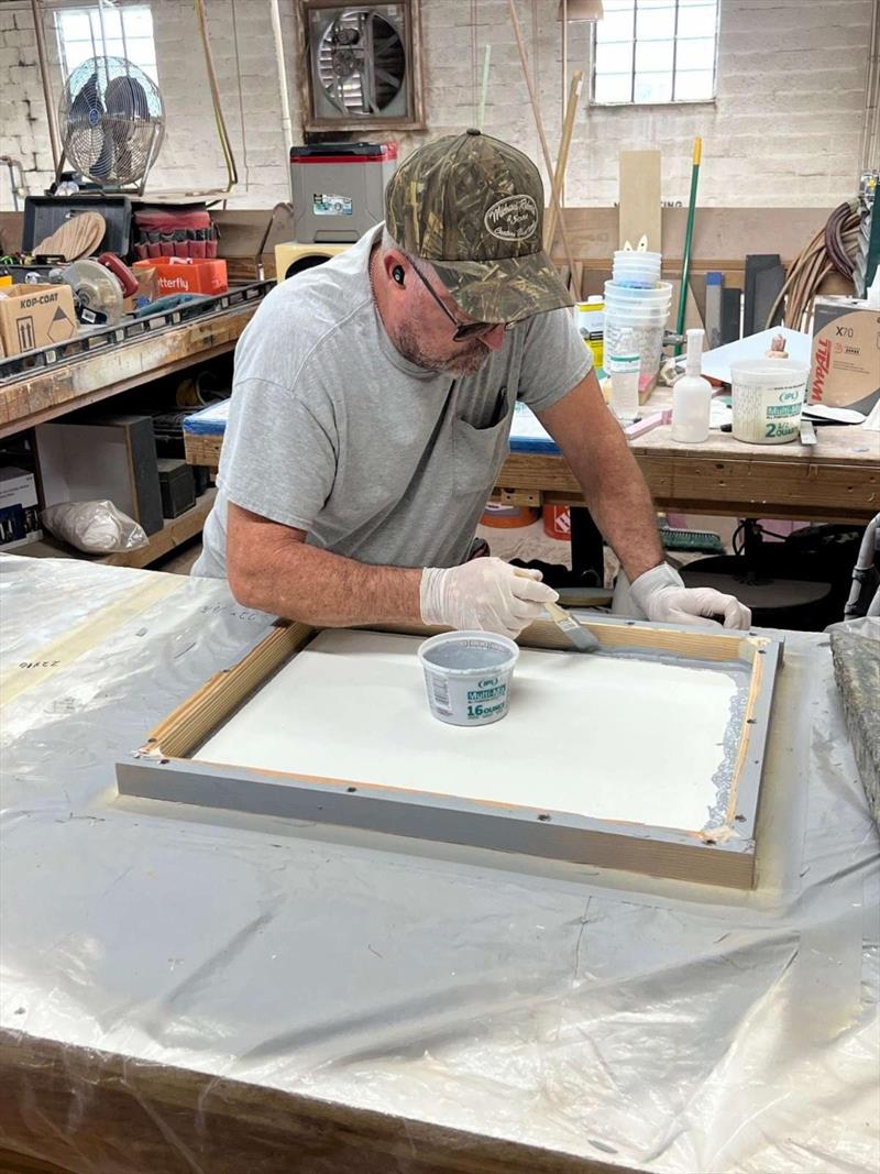 Hull #10 - John S. on hatch combings - photo © Michael Rybovich & Sons