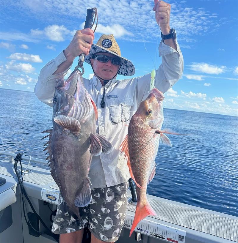 Craig with a bar cod and snapper from a deep dropping session that saw the lads haul in plenty of fat pearlies and jobbies too - photo © Fisho's Tackle World