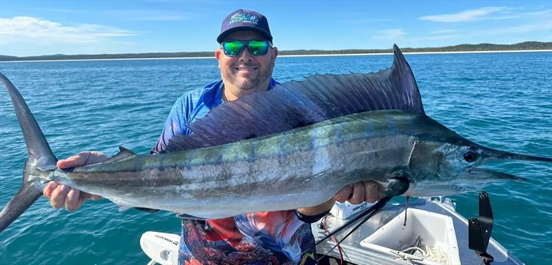 Brett proving that marlin can turn up at any time. This little fella must ve got lost - photo © Fisho's Tackle World