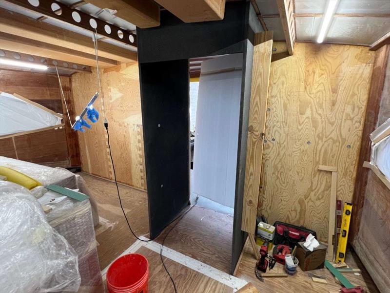 Hull #11 - Interior salon bulkhead installation - photo © Michael Rybovich & Sons
