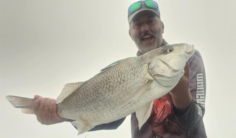 Tony bettered his previous grunter PB with this beaut 67cm 3.8kg model, caught in that crazy fog a bit ago - photo © Fisho's Tackle World