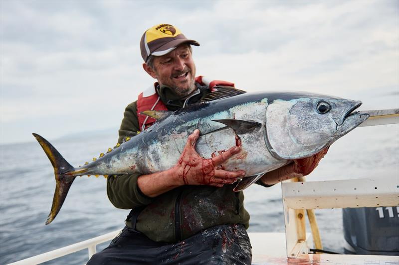 Adrian with a Dart Bank schoolie - photo © Spot On Fishing Hobart