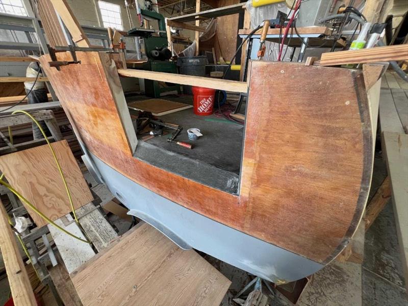 Hull #11 - Cutting in the transom door - photo © Michael Rybovich & Sons