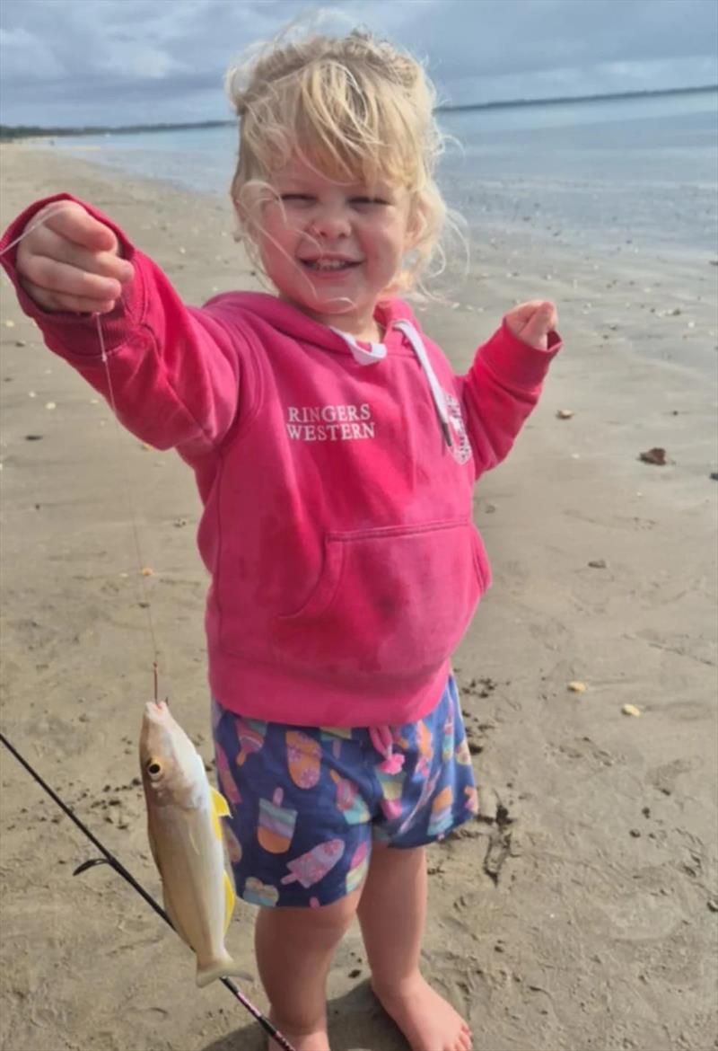 Little Stella was very happy catching her first ever whiting from a local beach - photo © Fisho's Tackle World Hervey Bay