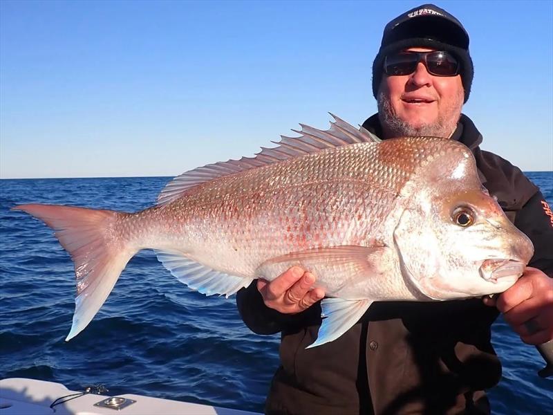 If you want to get into the bay's inshore snapper on charter, then Tri from Fraser Guided Fishing is your man. Just ask this fella - photo © Fisho's Tackle World Hervey Bay
