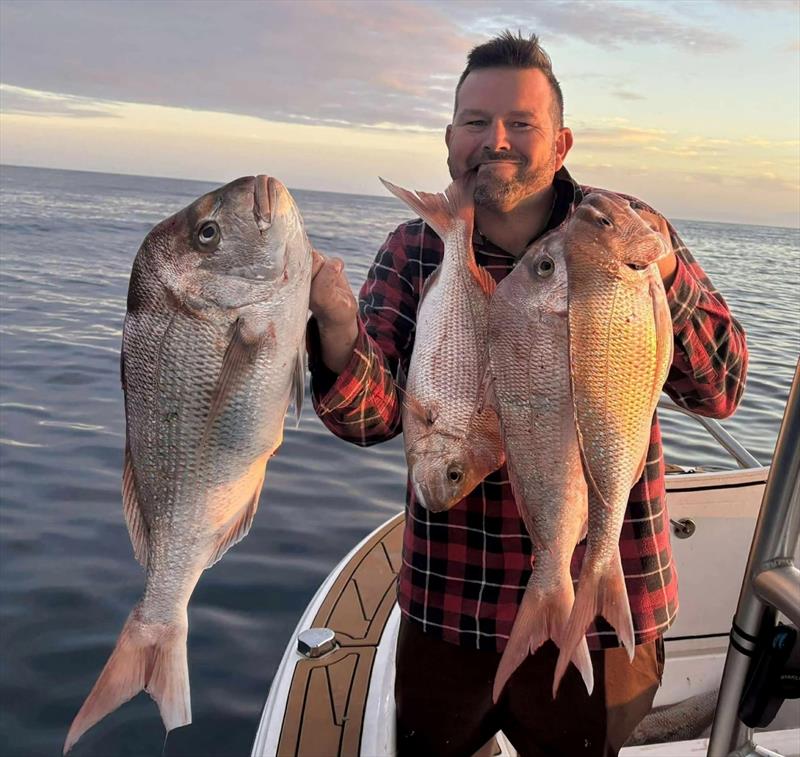 Brett Bartlett with a bag limit of snapper. That's a unique way of holding up four fish Brett! - photo © Fisho's Tackle World Hervey Bay