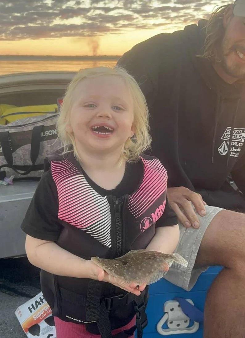 Mia Ross thought this little flounder was cute and loved fishing with her dad, Chris photo copyright Fisho's Tackle World Hervey Bay taken at  and featuring the Fishing boat class