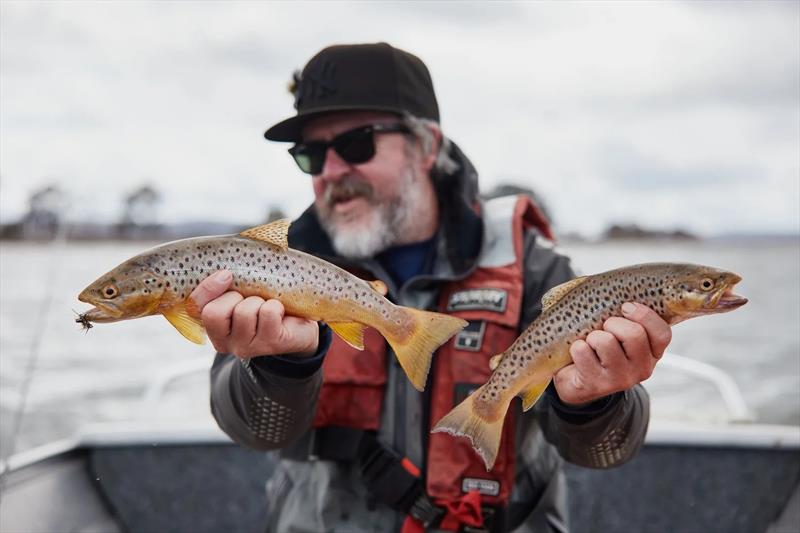 Marcus with a double hook up of Arthur's fish - photo © Spot On Fishing Hobart