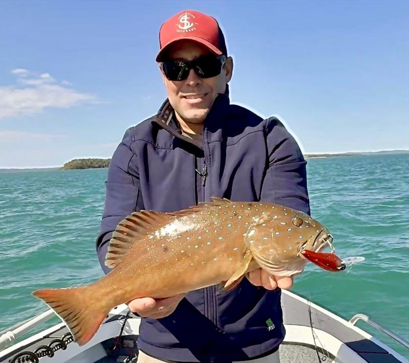 Luke with a nice trout proving he can still catch them in winter by trolling a Grumpy Lures Trout Candy - photo © Fisho's Tackle World Hervey Bay