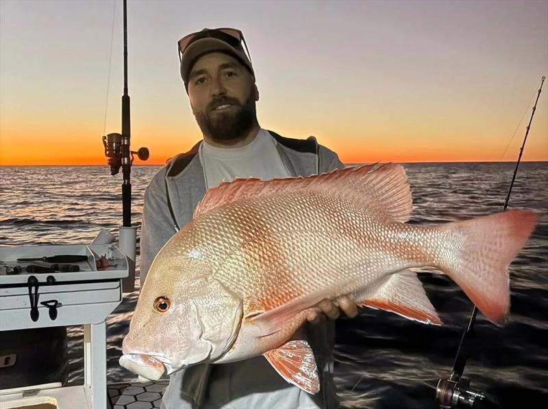 Aedan often does the big miles to catch ripper reds like this one. Looks like they will be safe this week though - photo © Fisho's Tackle World Hervey Bay