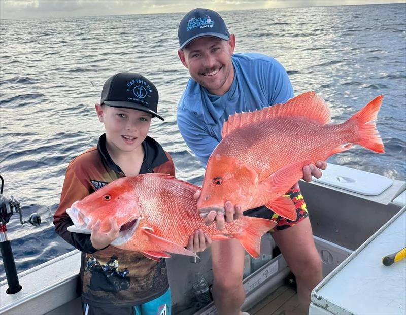 Gary and son Jimmy got stuck into the reds on their recent 1770 reef trip - photo © Fisho's Tackle World Hervey Bay