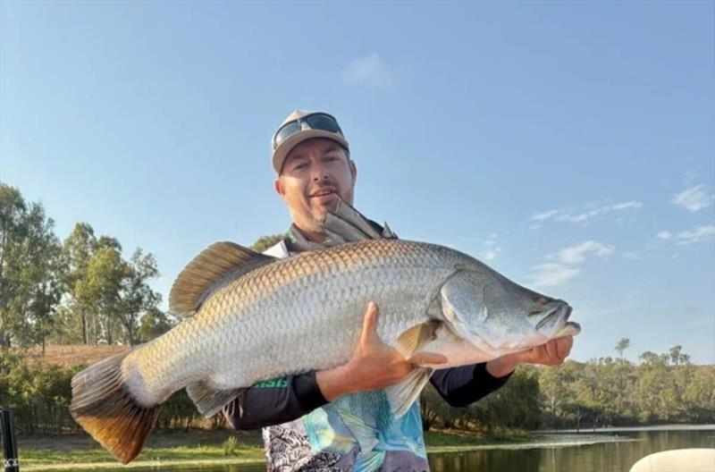 Deej with a sample of the quality of fish deemed average in Lake Monduran these days - photo © Fisho's Tackle World Hervey Bay