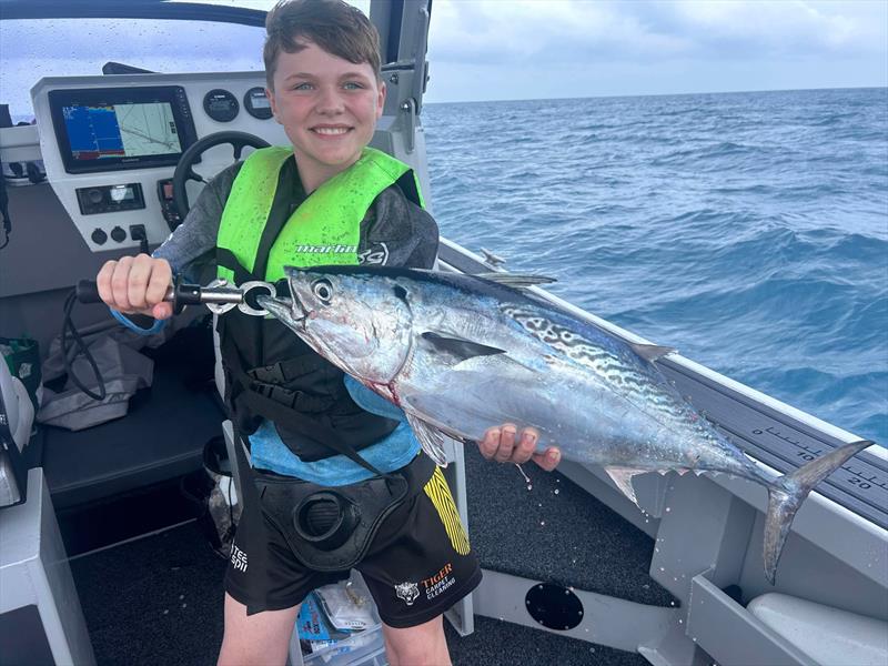Hamish was more than happy to spend time catching mac tuna on a recent bay trip - photo © Fisho's Tackle World Hervey Bay