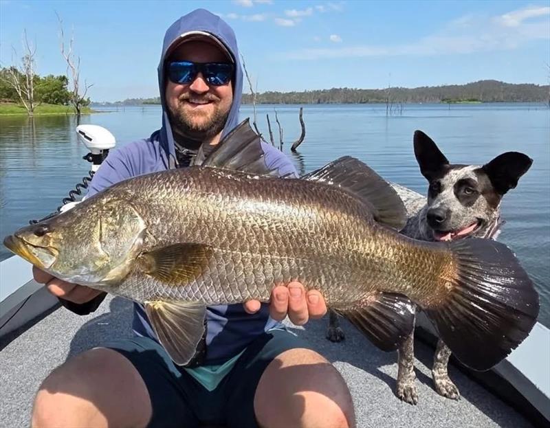 Ben's pooch was impressed with this quality impoundment barra photo copyright Fisho's Tackle World Hervey Bay taken at  and featuring the Fishing boat class
