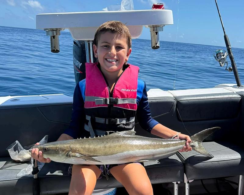 Tarj with a lap full of cobia from a recent reef fishing mission - photo © Fisho's Tackle World Hervey Bay