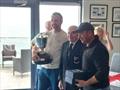 Niall O'Brien (l) and Dermot O'Flaherty (r) flank Terry Windsor as they receive the Flying Fifteen Championship of Ireland Trophy. Terry, who recently celebrated his 90th Birthday, is a former Flying Fifteen sailor and a stalwart of Carrickfergus SC &copy; Cormac Bradley