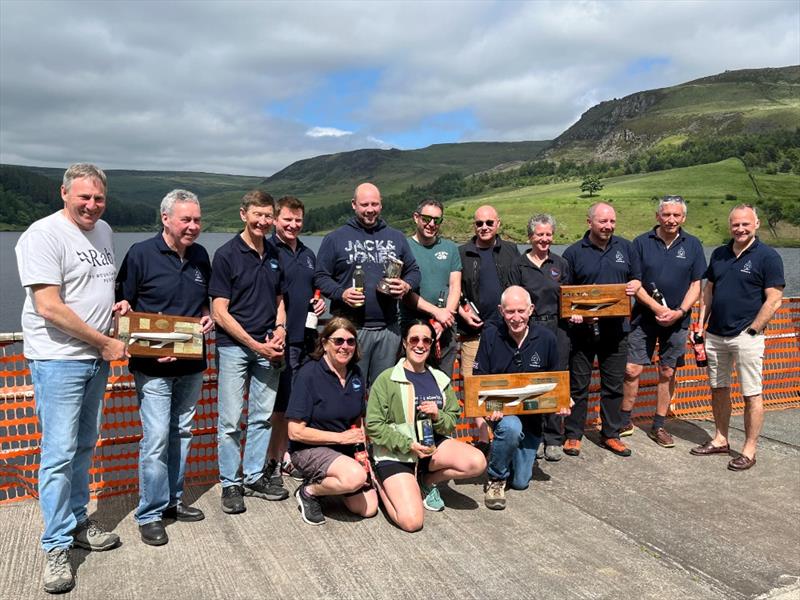 Dovestone Flying Fifteen Open (l-r) Tim Allen, Iain McNeill, Michael Harris, Andrew McKee, Rich Jones, Chis Massey, Ian Hockey, Anne Webb, David McKee, Mal Hartland crouching Sarah Harris, Val Hockey, Graham Massey photo copyright Nik Lever taken at Dovestone Sailing Club and featuring the Flying Fifteen class