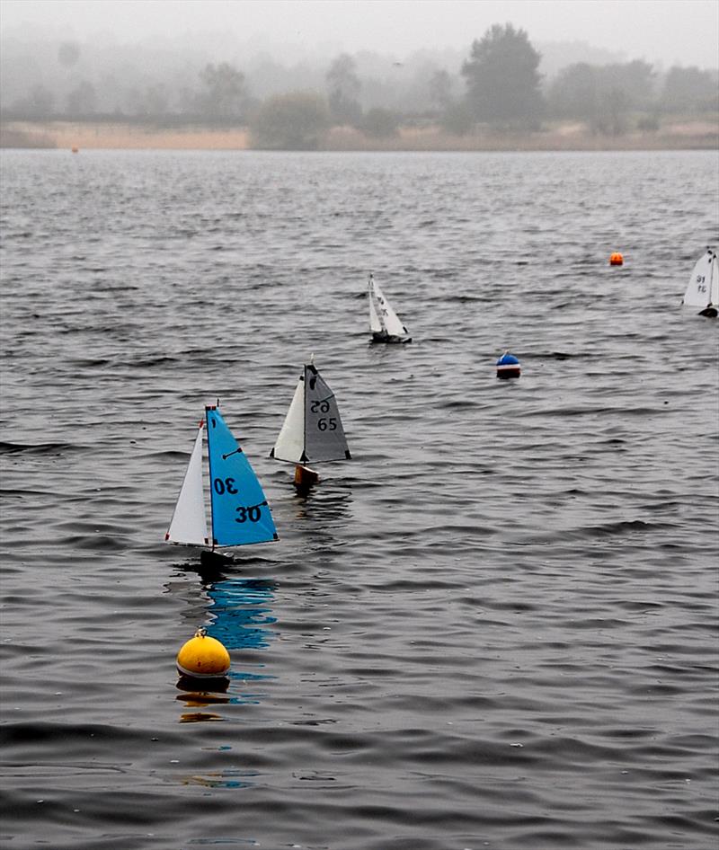 Videlo Globe Footy open at Frensham photo copyright Roger Stollery taken at Frensham Pond Sailing Club and featuring the Footy class