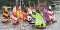 Fleet leaving start line on day 1 of the Fowey River Dinghy Championship © Jane Spencer