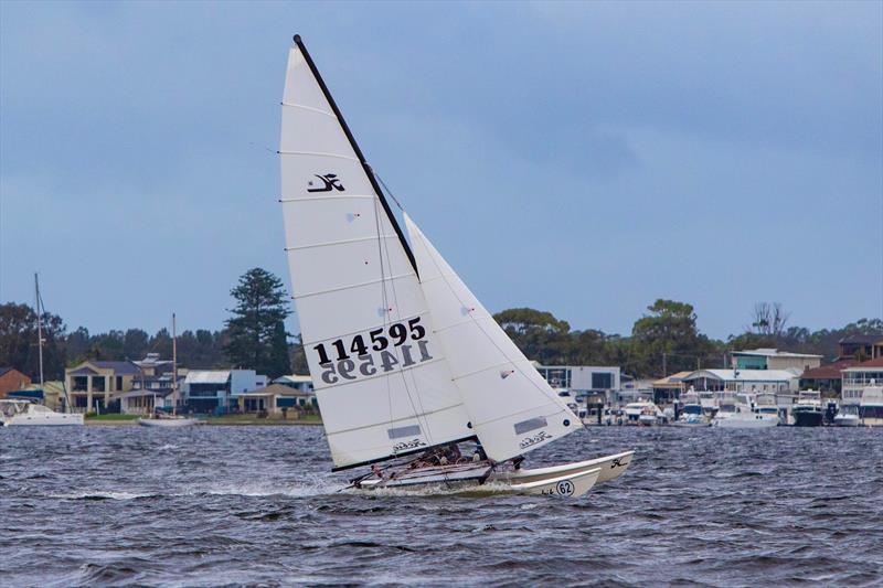 Noah Skewes Third Race 1 - Zhik Combined High Schools Sailing Championships photo copyright Red Hot Shotz Sports Photography taken at Belmont 16ft Sailing Club and featuring the Hobie 16 class