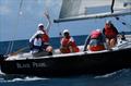 6th Annual USVI Hotel & Tourism Association Regatta - Team Pink Palm Hotel, L to R: Brent Pelton (far left, waving), STYC Coach Dennis Nixon (in front of Pelton), Jason Fleming, Louis Pierre Anderson-Morshead, Elisa James © STSC / C Bareuther