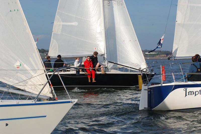 Imptish leads the Impala fleet over the line during the Hamble River Bottle Pursuit Race photo copyright Trevor Pountain taken at Hamble River Sailing Club and featuring the Impala 28 class