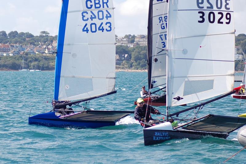 The gun has just gone and the two overall front runners indulge in a drag race away to the favoured left hand side - Lowrider International Moth UK National Championship day 2 photo copyright Dougal Henshall taken at Weymouth & Portland Sailing Academy and featuring the International Moth class