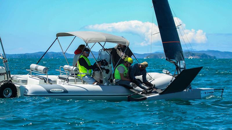 Mattias Coutts takes a break between races with his support team - Day 5 - 2024 PredictWind Moth Worlds - Manly Sailing Club. January 9, 2025 - photo © Richard Gladwell - Sail-World.com/nz