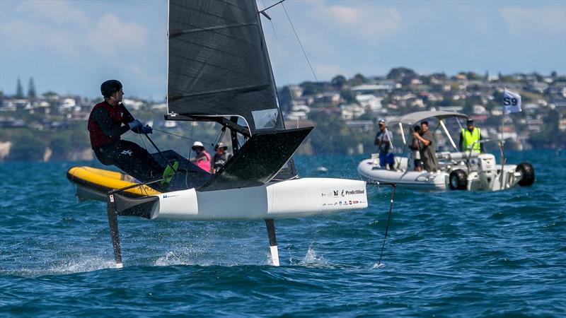 Jake Pye crosses the finish line to win the Final Race watched by the Coutts support team   - Day 5 - 2024 PredictWind Moth Worlds - Manly Sailing Club. January 9, 2025 photo copyright Richard Gladwell - Sail-World.com/nz taken at Manly Sailing Club and featuring the International Moth class